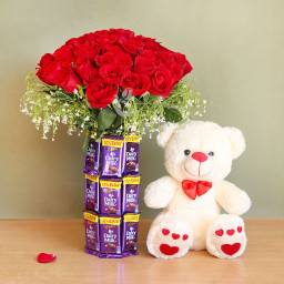 Darling Delight: A Gift Combo of 20 Red Roses and 18 Dairy Milk Arrangement, and 12 Inch Teddy Darling Delight: A Gift Combo of 20 Red Roses and 18 Dairy Milk Arrangement, and 12 Inch Teddy