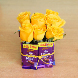 Bond of Friendship: A Gift Combo of 9 Yellow Roses, Square Glass Vase, and 8 Dairy Milk Bond of Friendship: A Gift Combo of 9 Yellow Roses, Square Glass Vase, and 8 Dairy Milk