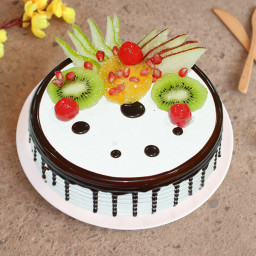 Fruit cake with melted chocolate on the top