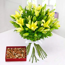 Dry Fruits With Glads: A Gift Combo of 8 Yellow Lilies and 0.5 Kg Dry Fruit Dry Fruits With Glads: A Gift Combo of 8 Yellow Lilies and 0.5 Kg Dry Fruit