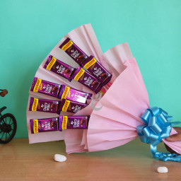 Sweet N Simple: A Gift Combo of 10 Dairy Milk chocolates bouquet Sweet N Simple: A Gift Combo of 10 Dairy Milk chocolates bouquet