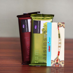 2 Cadbury Temptations (72gm each), 1 Rakhi 2 Cadbury Temptations (72gm each), 1 Rakhi