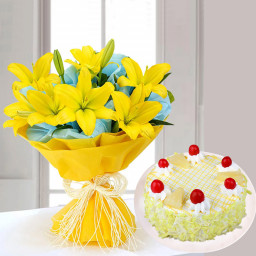 Vibrant Lilies with cake: A Gift Combo of 5 Lilies and 0.5 Kg Pineapple Cake Vibrant Lilies with cake: A Gift Combo of 5 Lilies and 0.5 Kg Pineapple Cake
