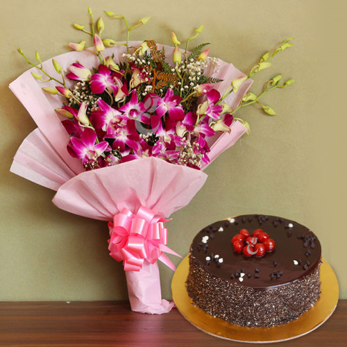Lavish Orchids  Combo: A Gift Combo of 6 Orchids and 0.5 Kg Chocolate Cake