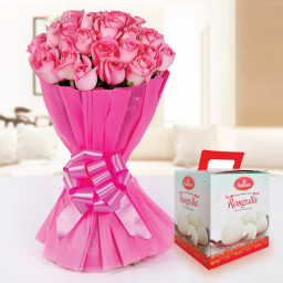 Aroma Of Love: A Gift Combo of 20 Pink Roses and 1 Kg Rasgulla. Aroma Of Love: A Gift Combo of 20 Pink Roses and 1 Kg Rasgulla.