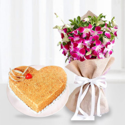 Stocked With Emotions: A Gift Combo of 6 Purple Orchids and 0.5 kg Overloaded Butterscotch Cake Stocked With Emotions: A Gift Combo of 6 Purple Orchids and 0.5 kg Overloaded Butterscotch Cake