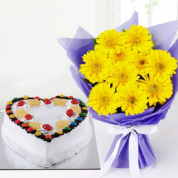 Shining With Joy: A Gift Combo of 12 Yellow Gerberas and 0.5 kg Heart-Shaped Pineapple Gems Cake Shining With Joy: A Gift Combo of 12 Yellow Gerberas and 0.5 kg Heart-Shaped Pineapple Gems Cake