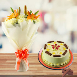 Bridge To Heart: A Gift Combo of 10 Yellow Carnations, 2 Yellow Lilies and 0.5 kg KitKat Butterscotch Cake Bridge To Heart: A Gift Combo of 10 Yellow Carnations, 2 Yellow Lilies and 0.5 kg KitKat Butterscotch Cake