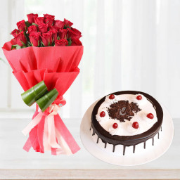 Showering Blessings: A Gift Combo of 20 Red Roses and 0.5 kg Black Forest Cake Showering Blessings: A Gift Combo of 20 Red Roses and 0.5 kg Black Forest Cake