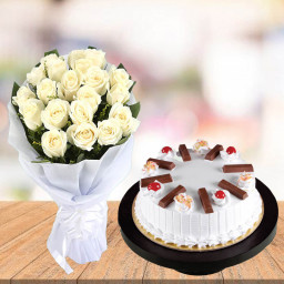 Peace-Savvy Binary: A Gift Combo of 20 White Roses and 0.5 kg KitKat Vanilla Cake Peace-Savvy Binary: A Gift Combo of 20 White Roses and 0.5 kg KitKat Vanilla Cake