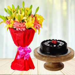 Vibes That Matches Yours: A Gift Combo of 8 Yellow Lilies, 6 Pink Gerberas and 0.5 kg Dark Truffle Cream Cake Vibes That Matches Yours: A Gift Combo of 8 Yellow Lilies, 6 Pink Gerberas and 0.5 kg Dark Truffle Cream Cake
