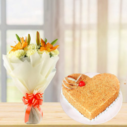 Bundle Of Love Lush: A Gift Combo of 10 Yellow Carnations, 2 Yellow Lilies and 0.5 kg Heart-Shaped Butterscotch Cake Bundle Of Love Lush: A Gift Combo of 10 Yellow Carnations, 2 Yellow Lilies and 0.5 kg Heart-Shaped Butterscotch Cake