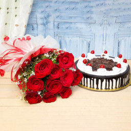 Ruby Forest: A Gift Combo of 10 Red Roses and 0.5 kg Black Forest Cake Ruby Forest: A Gift Combo of 10 Red Roses and 0.5 kg Black Forest Cake