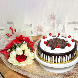 Sunset Harmony: A Gift Combo of 9 White and 1 Red Rose and 0.5 kg Black Forest Cake Sunset Harmony: A Gift Combo of 9 White and 1 Red Rose and 0.5 kg Black Forest Cake