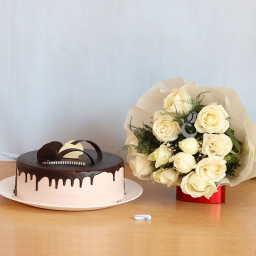 Serene Love: A Gift Combo of 10 white roses and 0.5 kg chocolate cake Serene Love: A Gift Combo of 10 white roses and 0.5 kg chocolate cake