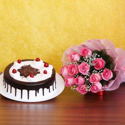 Falling for You: A Gift Combo of 12 pink roses and 0.5 kg Black Forest cake Falling for You: A Gift Combo of 12 pink roses and 0.5 kg Black Forest cake