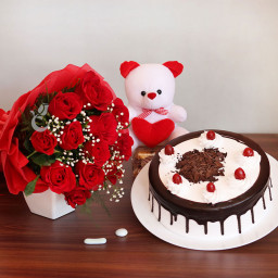 Charm Your Love: A Gift Combo of 10 red roses, 6 inch teddy and 0.5 kg Black Forest cake Charm Your Love: A Gift Combo of 10 red roses, 6 inch teddy and 0.5 kg Black Forest cake