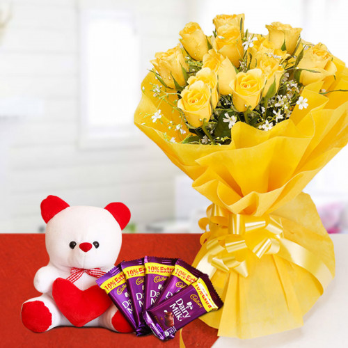 Cuteness Overload: A Gift Combo of 10 yellow roses, 5 Cadbury Dairy Milk chocolates and 6 inch teddy bear