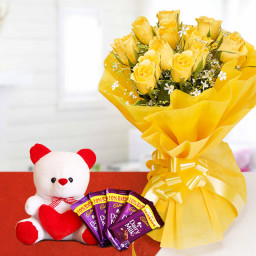 Cuteness Overload: A Gift Combo of 10 yellow roses, 5 Cadbury Dairy Milk chocolates and 6 inch teddy bear Cuteness Overload: A Gift Combo of 10 yellow roses, 5 Cadbury Dairy Milk chocolates and 6 inch teddy bear