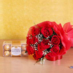 Vibrant Red Roses Combo: A Gift Combo of 10 red roses and 16 pcs Ferrero Rocher Vibrant Red Roses Combo: A Gift Combo of 10 red roses and 16 pcs Ferrero Rocher