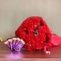 Sweet Perfection: A Gift Combo of 10 red carnations and 5 Dairy Milk chocolates Sweet Perfection: A Gift Combo of 10 red carnations and 5 Dairy Milk chocolates