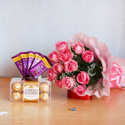 Pink Blooms With Choco Treats: A Gift Combo of 10 pink roses, 5 Dairy Milk chocolates and 16 Ferrero Rocher Pink Blooms With Choco Treats: A Gift Combo of 10 pink roses, 5 Dairy Milk chocolates and 16 Ferrero Rocher