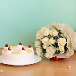 Serene White: A Gift Combo of 12 White Roses and 0.5 Kg Pineapple Cake Serene White: A Gift Combo of 12 White Roses and 0.5 Kg Pineapple Cake
