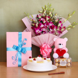 Classic Medley: A Gift Combo of 6 Orchids, 0.5 Kg Pineapple Cake, Greeting Card, 16 Ferrero Rocher and 6 Inch Teddy Classic Medley: A Gift Combo of 6 Orchids, 0.5 Kg Pineapple Cake, Greeting Card, 16 Ferrero Rocher and 6 Inch Teddy