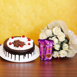 Sweet Carnival: A Gift Combo of 12 White Roses, 0.5 Kg Blackforest Cake and 2 Dairy Milk Silk Sweet Carnival: A Gift Combo of 12 White Roses, 0.5 Kg Blackforest Cake and 2 Dairy Milk Silk