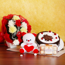 Celebration of Love: A Gift Combo of 0.5 Kg Black Forest Cake, 10 Mix Carnations, 6 Inch Teddy and 16 Ferrero Rocher Celebration of Love: A Gift Combo of 0.5 Kg Black Forest Cake, 10 Mix Carnations, 6 Inch Teddy and 16 Ferrero Rocher