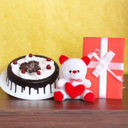 Sweet Greetings: A Gift Combo of 1 Lucky Bamboo, 0.5 Kg Black Forest Cake and 1 Greeting Card Sweet Greetings: A Gift Combo of 1 Lucky Bamboo, 0.5 Kg Black Forest Cake and 1 Greeting Card
