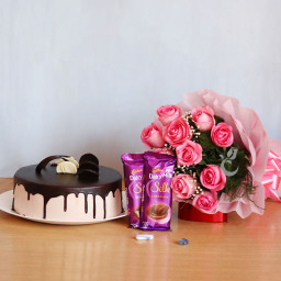 Perfect Love: A Gift Combo of 12 Pink Roses, 0.5 Kg Chocolate Cake and 2 Dairy Milk Silk Perfect Love: A Gift Combo of 12 Pink Roses, 0.5 Kg Chocolate Cake and 2 Dairy Milk Silk