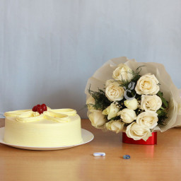 Symphony of Love: A Gift Combo of 12 White Roses and 0.5 Kg Butterscotch Cake Symphony of Love: A Gift Combo of 12 White Roses and 0.5 Kg Butterscotch Cake