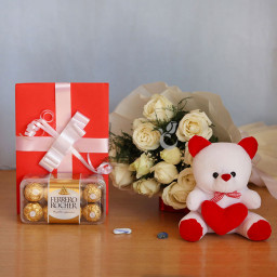 Cuteness Overloaded: A Gift Combo of 12 White Roses, 6 Inch Teddy, 16 pcs Ferrero Rocher and 1 Greeting Card Cuteness Overloaded: A Gift Combo of 12 White Roses, 6 Inch Teddy, 16 pcs Ferrero Rocher and 1 Greeting Card