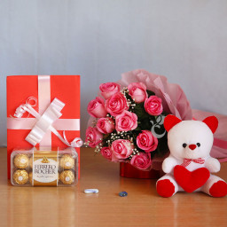 A Warm Hug: A Gift Combo of 10 Pink Roses, 6 Inch Teddy, 16 pcs Ferrero Rocher and 1 Greeting Card A Warm Hug: A Gift Combo of 10 Pink Roses, 6 Inch Teddy, 16 pcs Ferrero Rocher and 1 Greeting Card