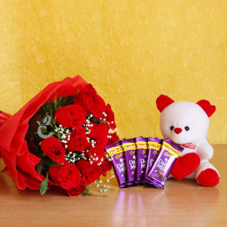 Sweet Expression: A Gift Combo of 10 red roses, 5 Cadbury Dairy Milk and a 6 inch teddy bear Sweet Expression: A Gift Combo of 10 red roses, 5 Cadbury Dairy Milk and a 6 inch teddy bear