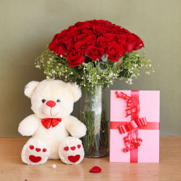 Love Confinement: A Gift Combo of 20 Red Roses, One Large Glass Vase, 12 Inch Teddy, and One Greeting Card Love Confinement: A Gift Combo of 20 Red Roses, One Large Glass Vase, 12 Inch Teddy, and One Greeting Card